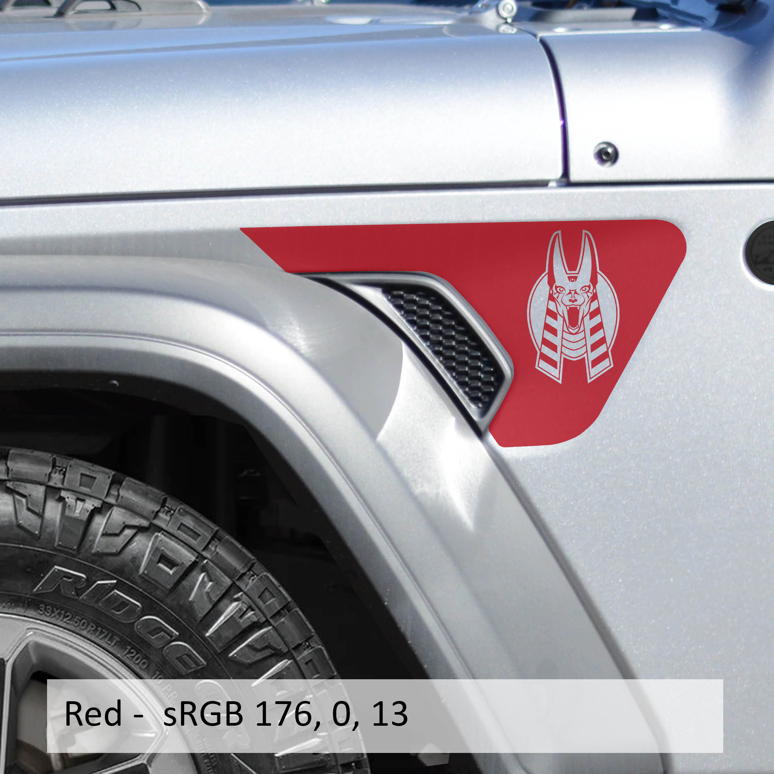 Red Egyptian Anubis head decal applied to Jeep billet aluminum fender vent insert
