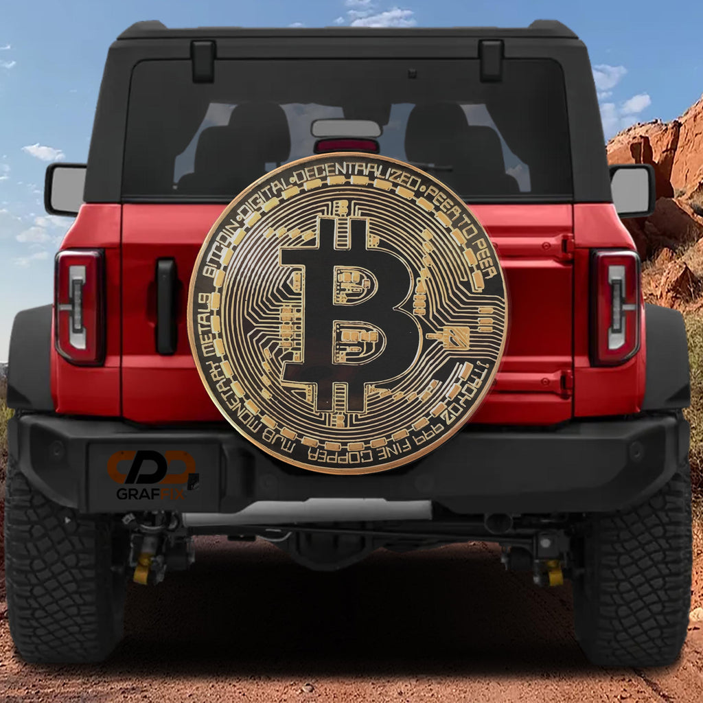Bitcoin Crypto Token spare tire cover mounted on a red Bronco rear with golden B coin and circuit ring