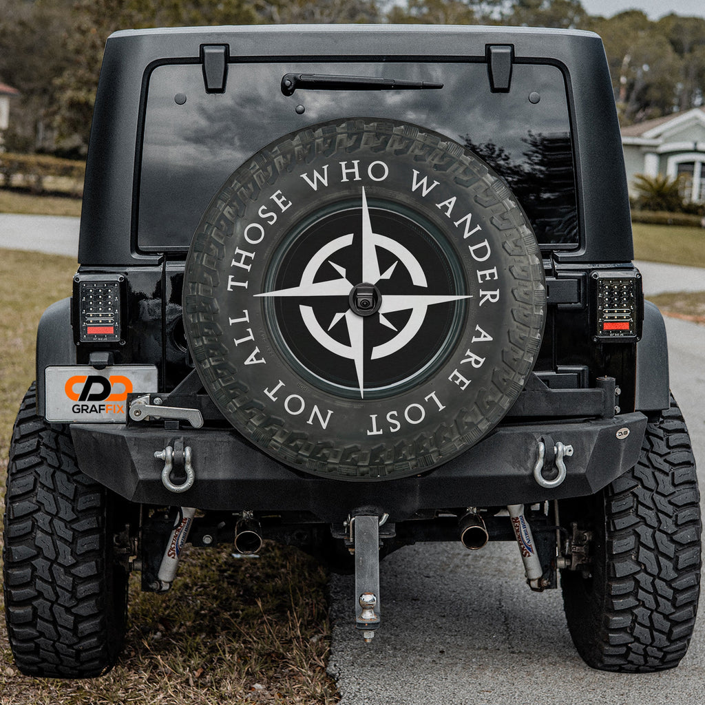 All-Terrain Wanderer spare tire cover installed on rear of Jeep vehicle