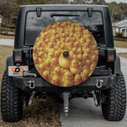 Rubber Duck Army spare tire cover on a black Jeep rear with massed yellow rubber ducks and central larger duck