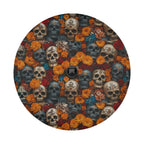 Flowers and skulls tire cover flat round front with marigold blooms, red roses, and stacked aged skull pile