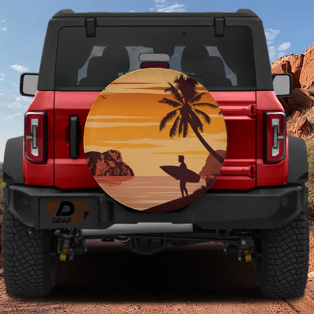 Sunset surfer tire cover front close-up showing tropical beach scene with palm tree and lone surfer silhouette