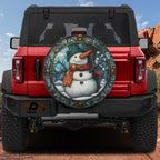 Red Ford Bronco rear with stained glass snowman holiday spare tire cover featuring orange scarf