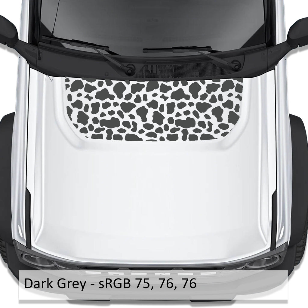 Cow Print blackout hood vinyl decal in dark gray shown installed on the hood of a 2021+ Ford Bronco