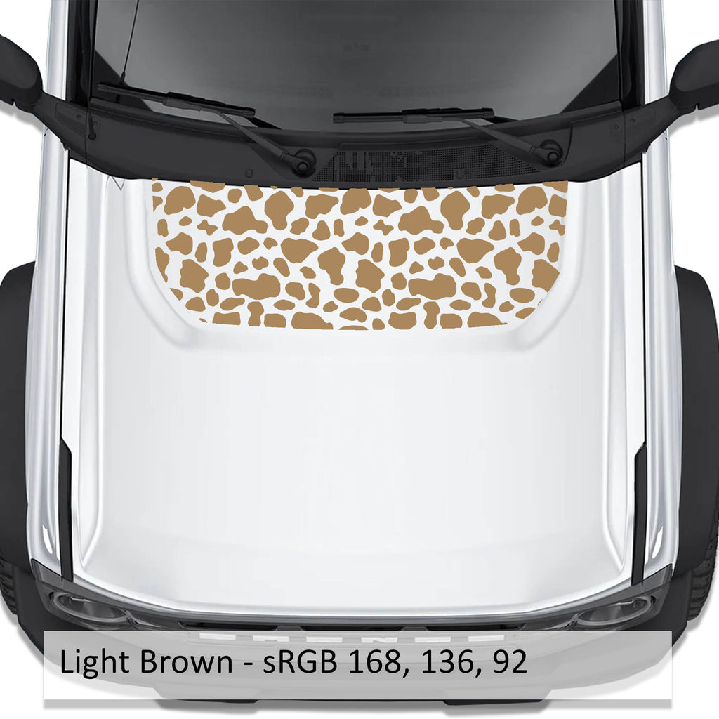 Cow Print blackout hood vinyl decal in light brown shown installed on the hood of a 2021+ Ford Bronco