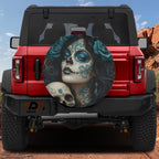 Turquoise Dia de los Muertos sugar skull spare tire cover printed design