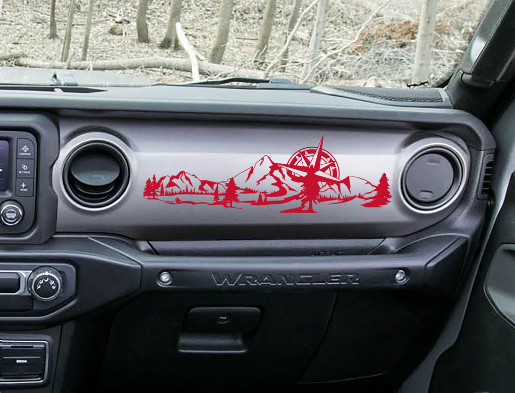 Red mountain compass scene dashboard transfer on grey Jeep Wrangler JL dash with pine trees and peaks