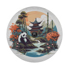 A panda sitting on a rock in a lush, colorful landscape with a pagoda in the background.