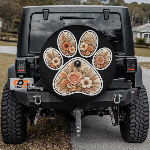 the back of a black Jeep Wrangler with a large floral decal on the rear window.
