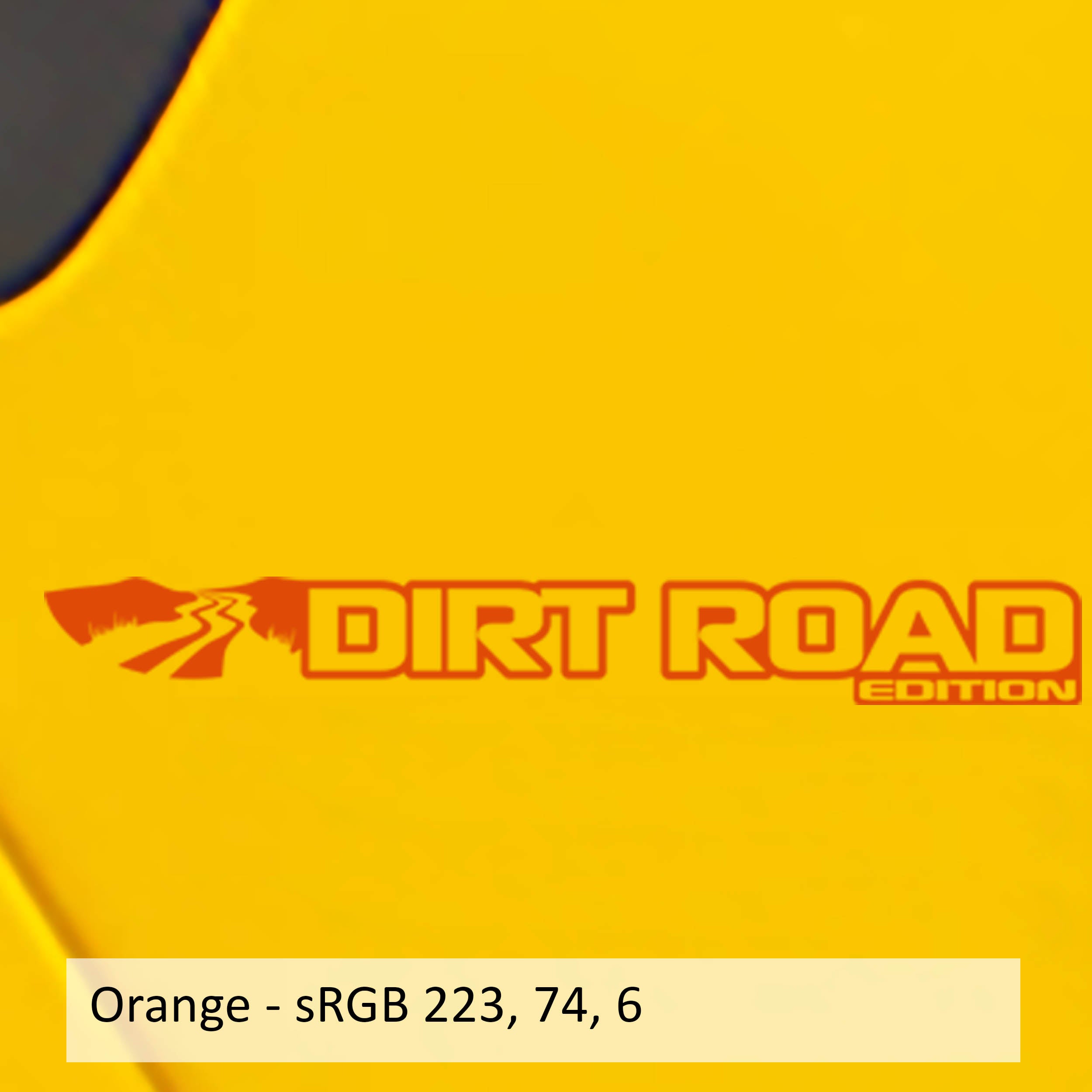 Dirt Road Edition fender decal pair in orange vinyl with mountain road graphic and text