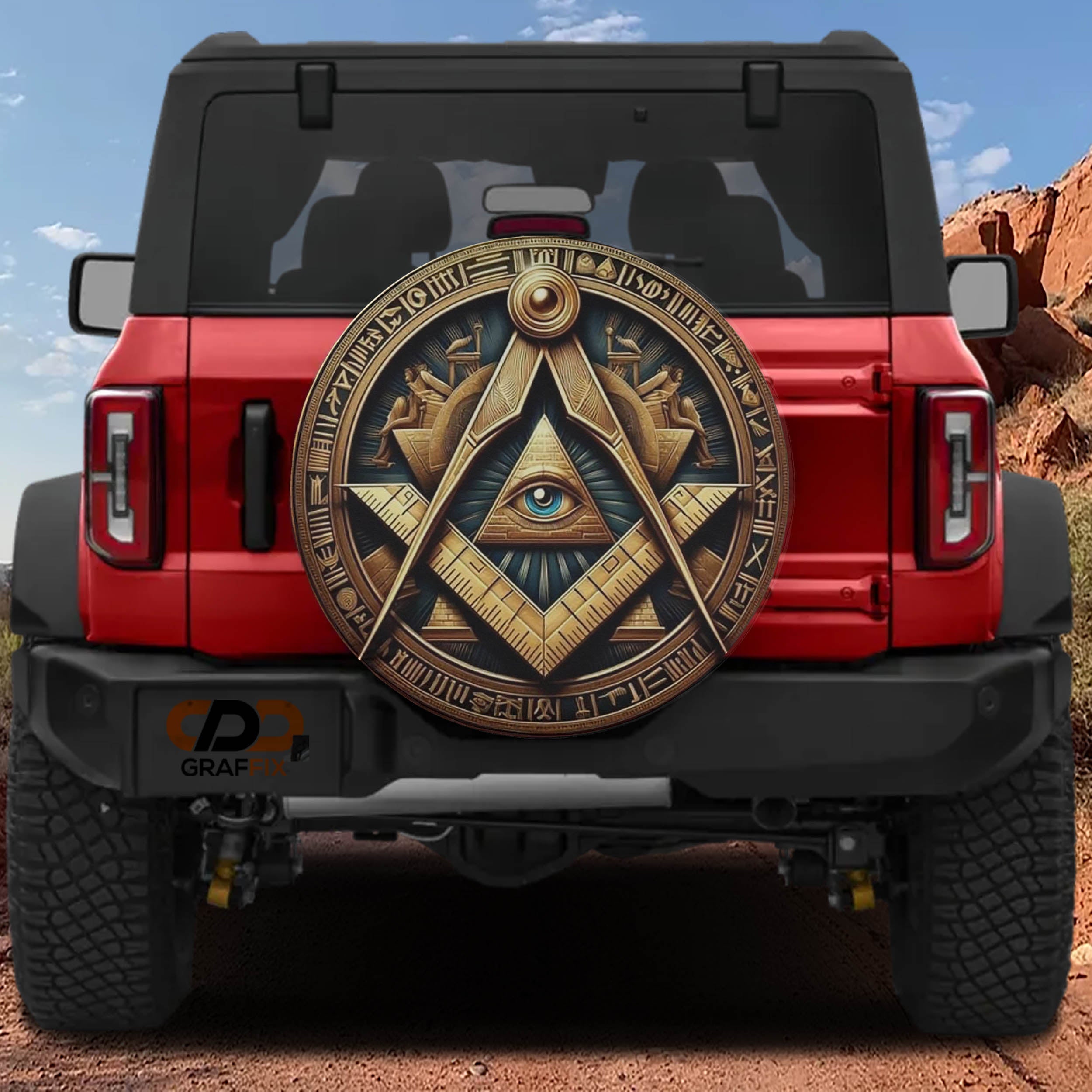 a red Jeep Wrangler with a large, ornate eye design on the rear window.