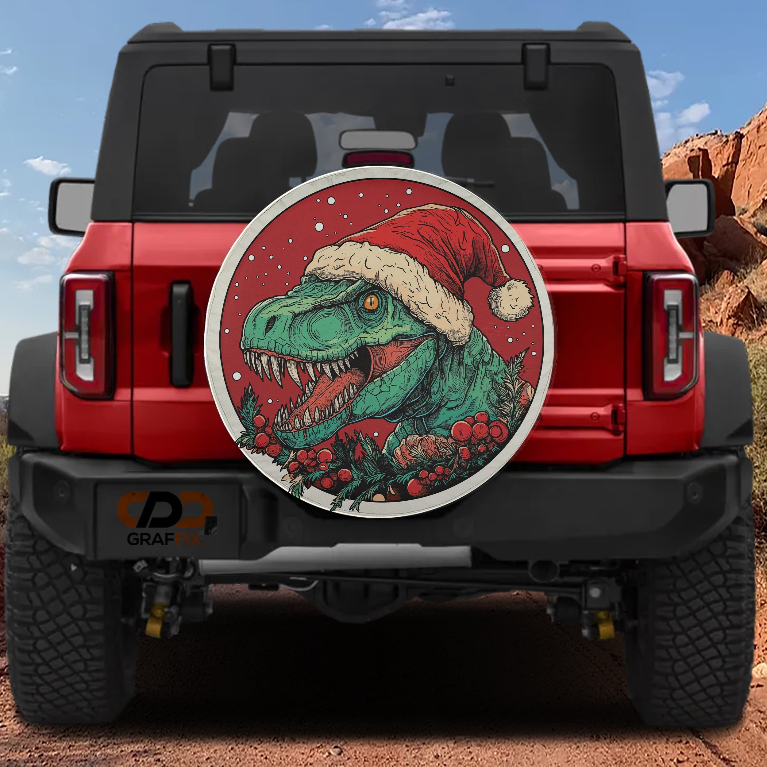 Red Ford Bronco rear with Dino Claus T-Rex Christmas spare tire cover featuring Santa hat and holly