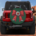 Coquette Santa belt bow spare tire cover on red Bronco green background red bow gold buckle design