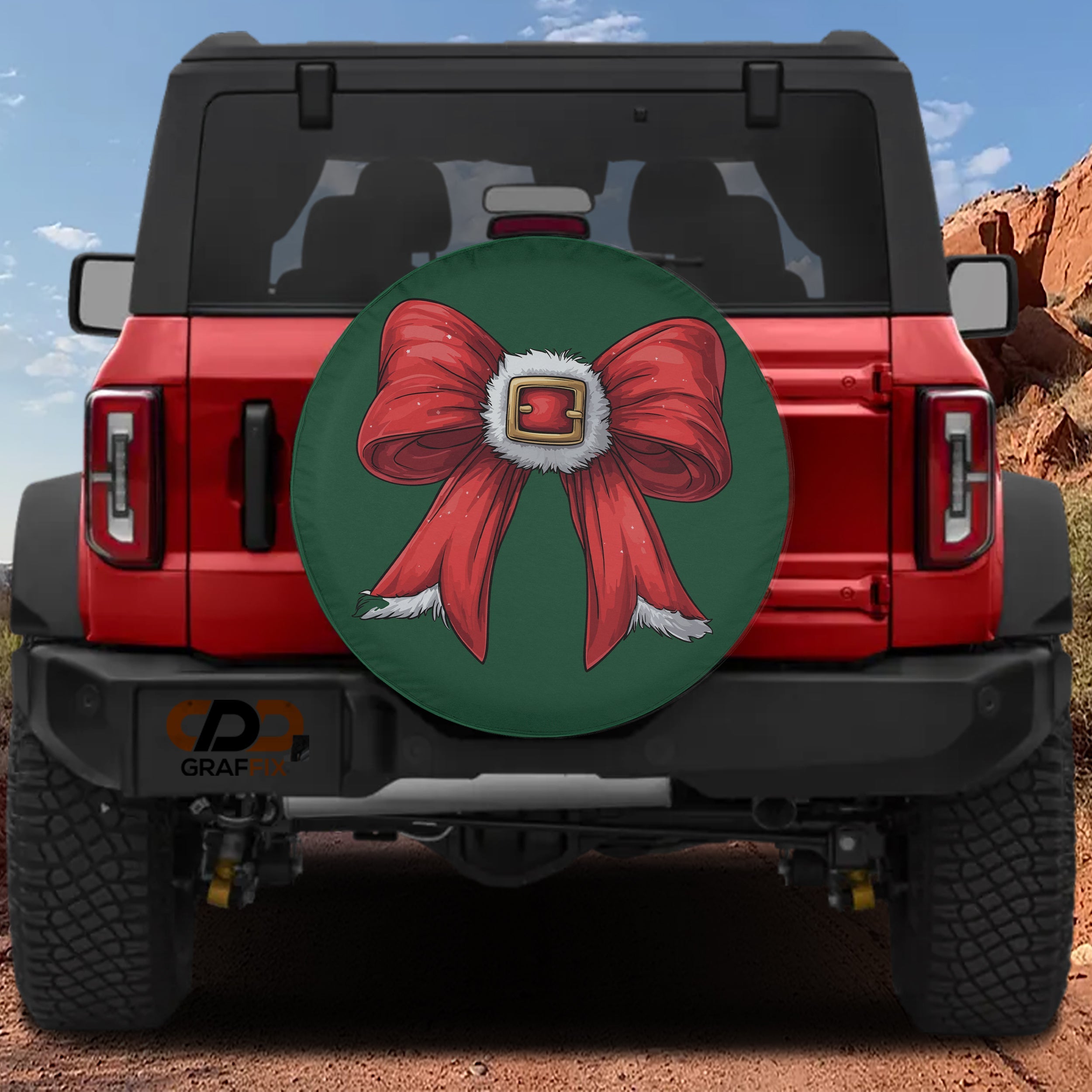 Coquette Santa belt bow spare tire cover on red Bronco green background red bow gold buckle design