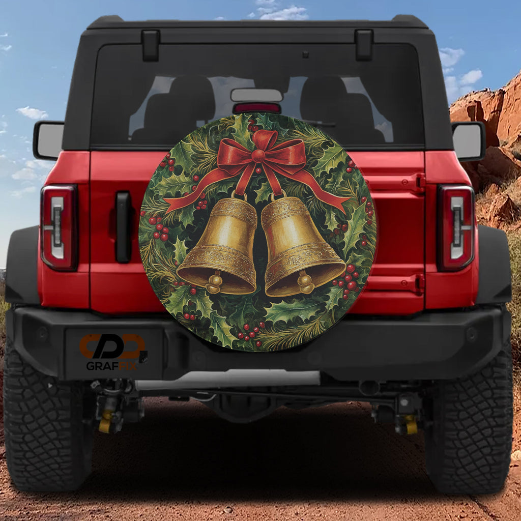 Golden Jingle Bells spare tire cover on a red Jeep Wrangler with wreath bells and red ribbon