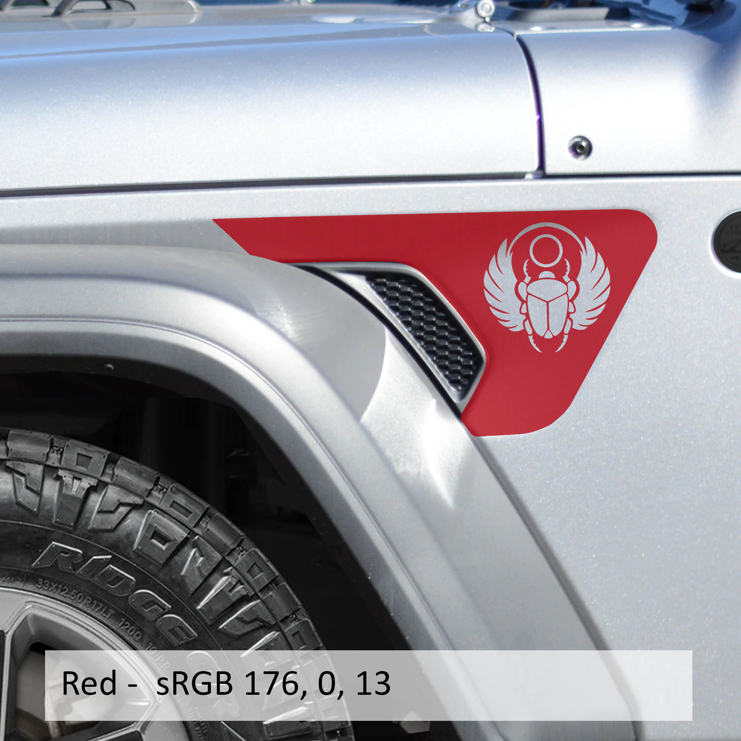 Red Egyptian scarab blackout fender vent decal installed on silver Jeep Wrangler JL billet vent