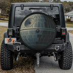 That's No Moon spare tire cover on black Jeep Wrangler with gray Death Star battle station