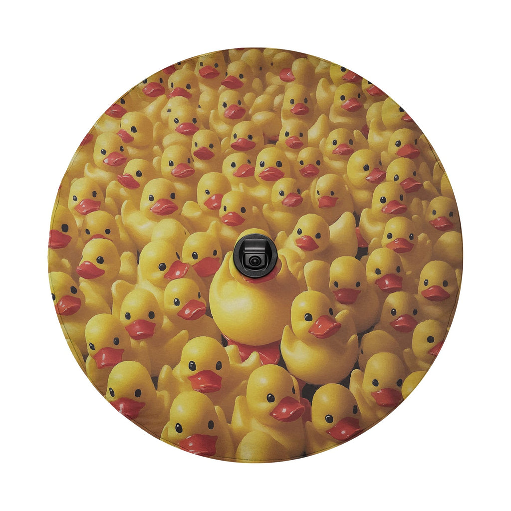 Rubber Duck Army spare tire cover flat artwork with backup camera hole among dozens of yellow rubber ducks