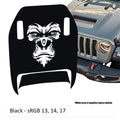 Black gorilla face clawed foot hood decal mock-up next to silver Jeep Wrangler JL grille