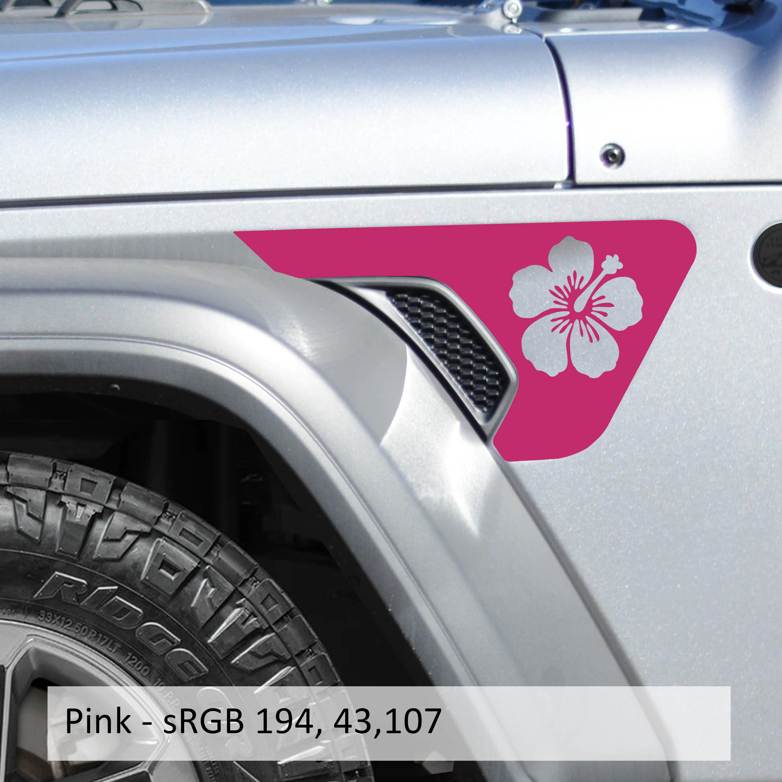 Pink hibiscus flower fender vent decals applied to silver Jeep Wrangler JL billet vent panel