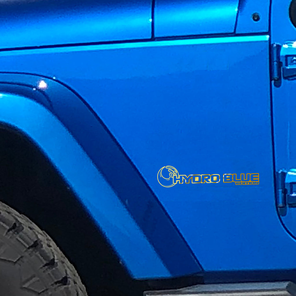 Gold Hydro Blue Edition wave fender decal pair installed on Jeep Wrangler JL Gladiator JT cowl