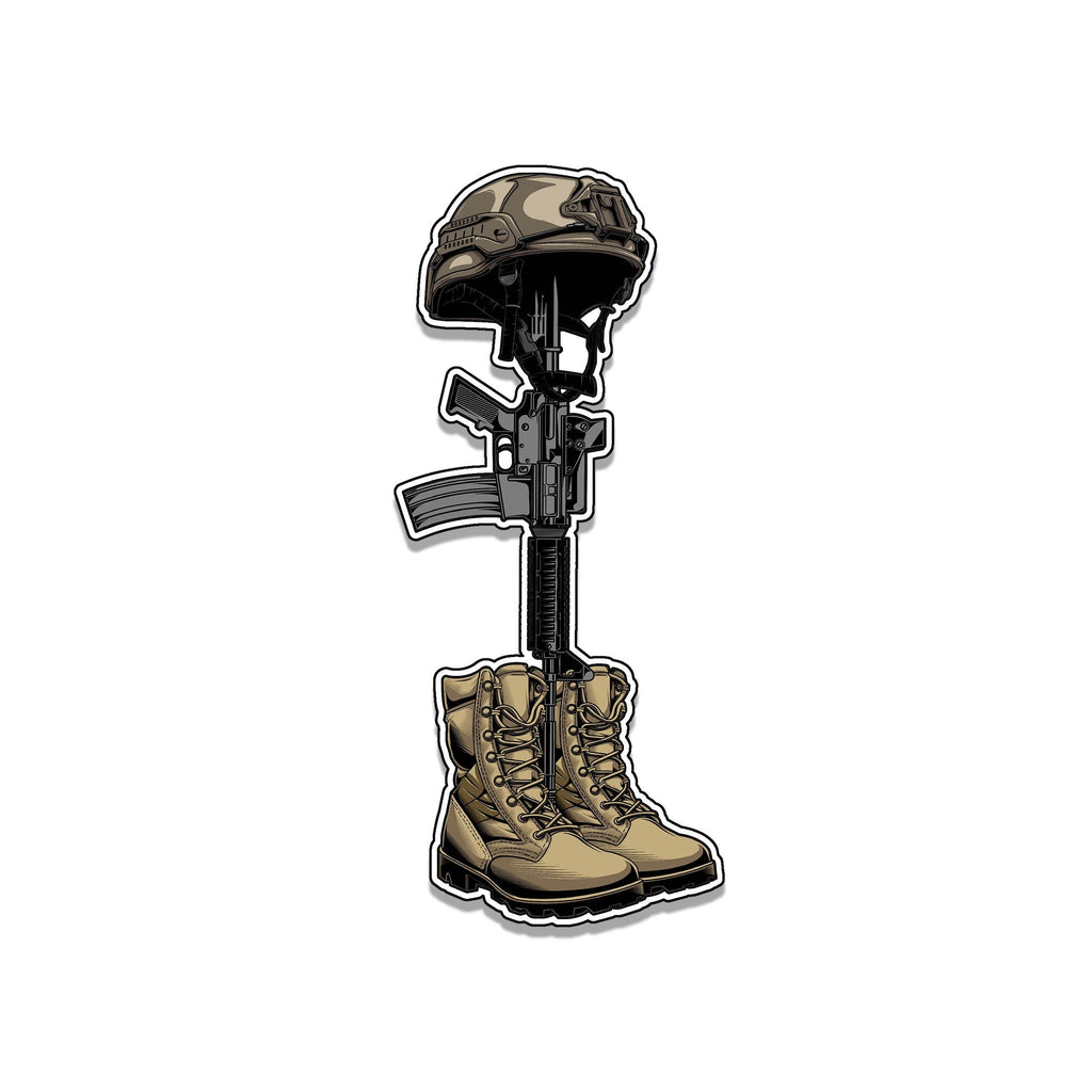 Illustrated battlefield cross sticker showing tan helmet on M16 rifle planted between desert combat boots