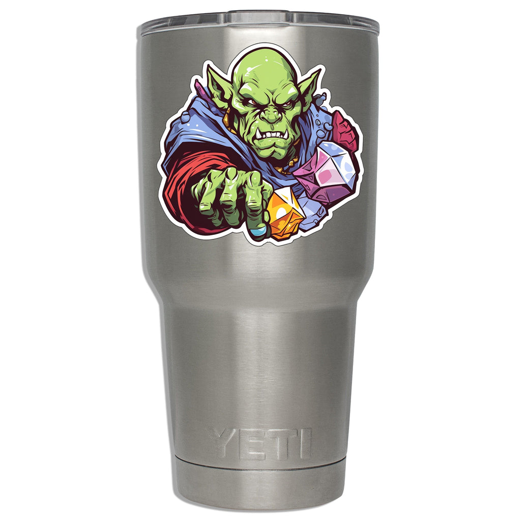 Goblin sorcerer sticker adhered to a stainless YETI tumbler displaying real size on insulated steel drinkware
