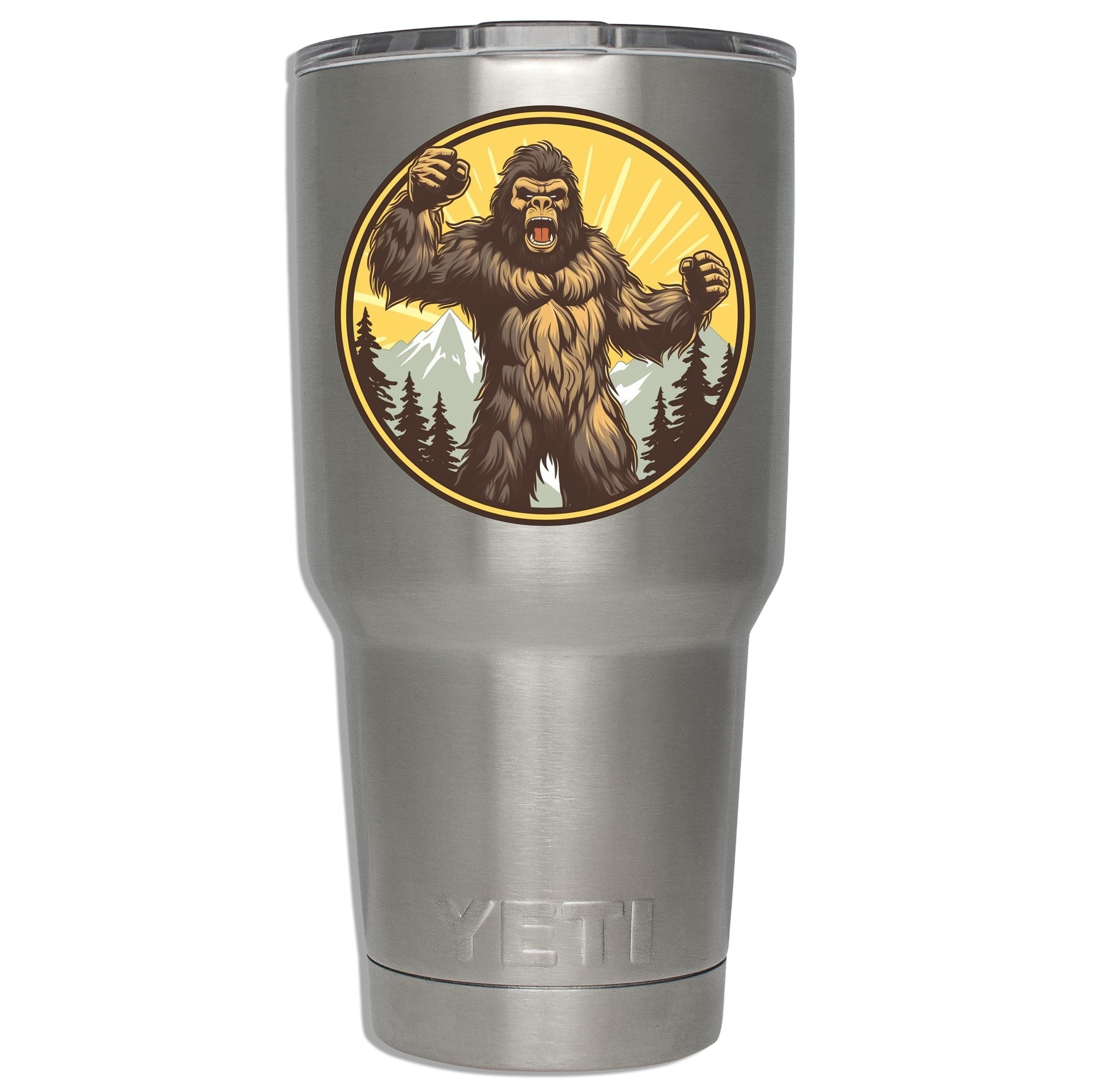 Roaring angry sasquatch decal mounted on stainless YETI tumbler showing size on insulated drinkware below lid