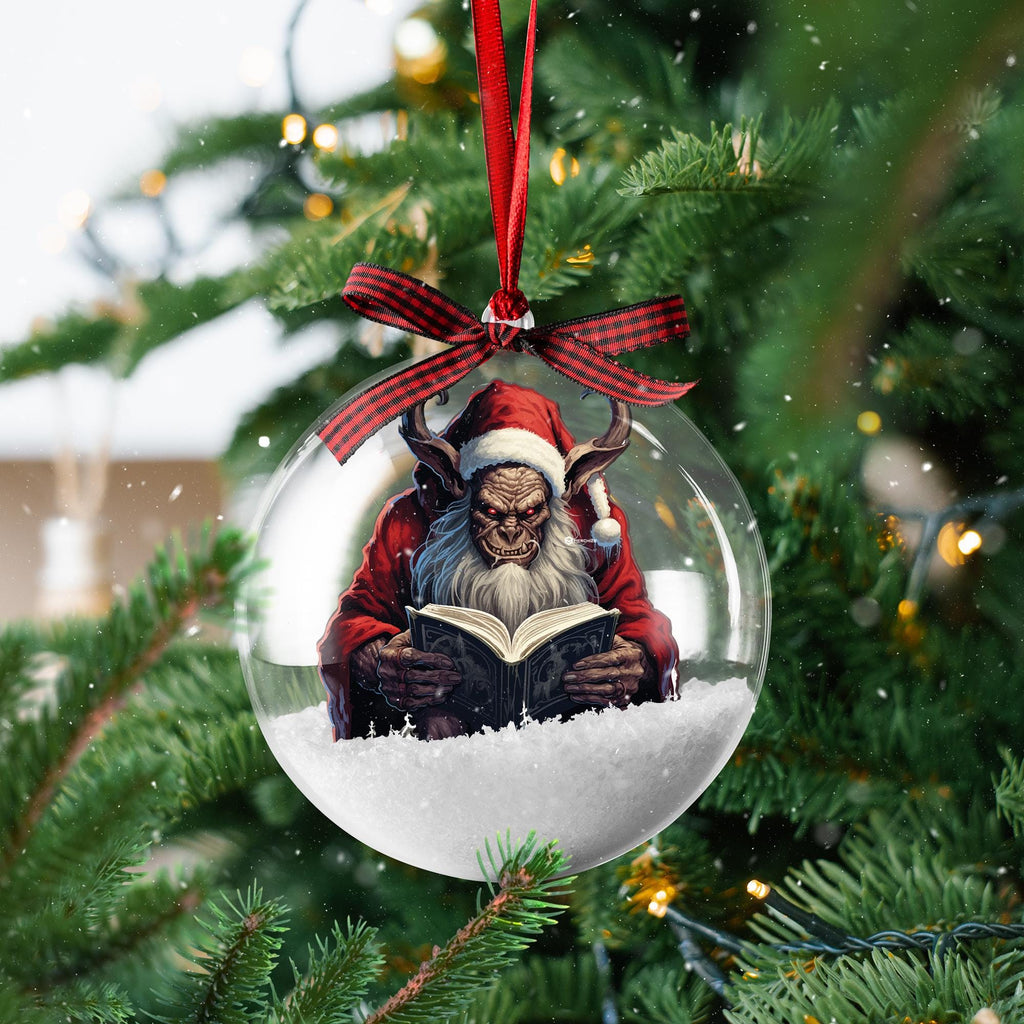 Krampus Storytime snow globe Christmas ornament with red plaid ribbon on a tree