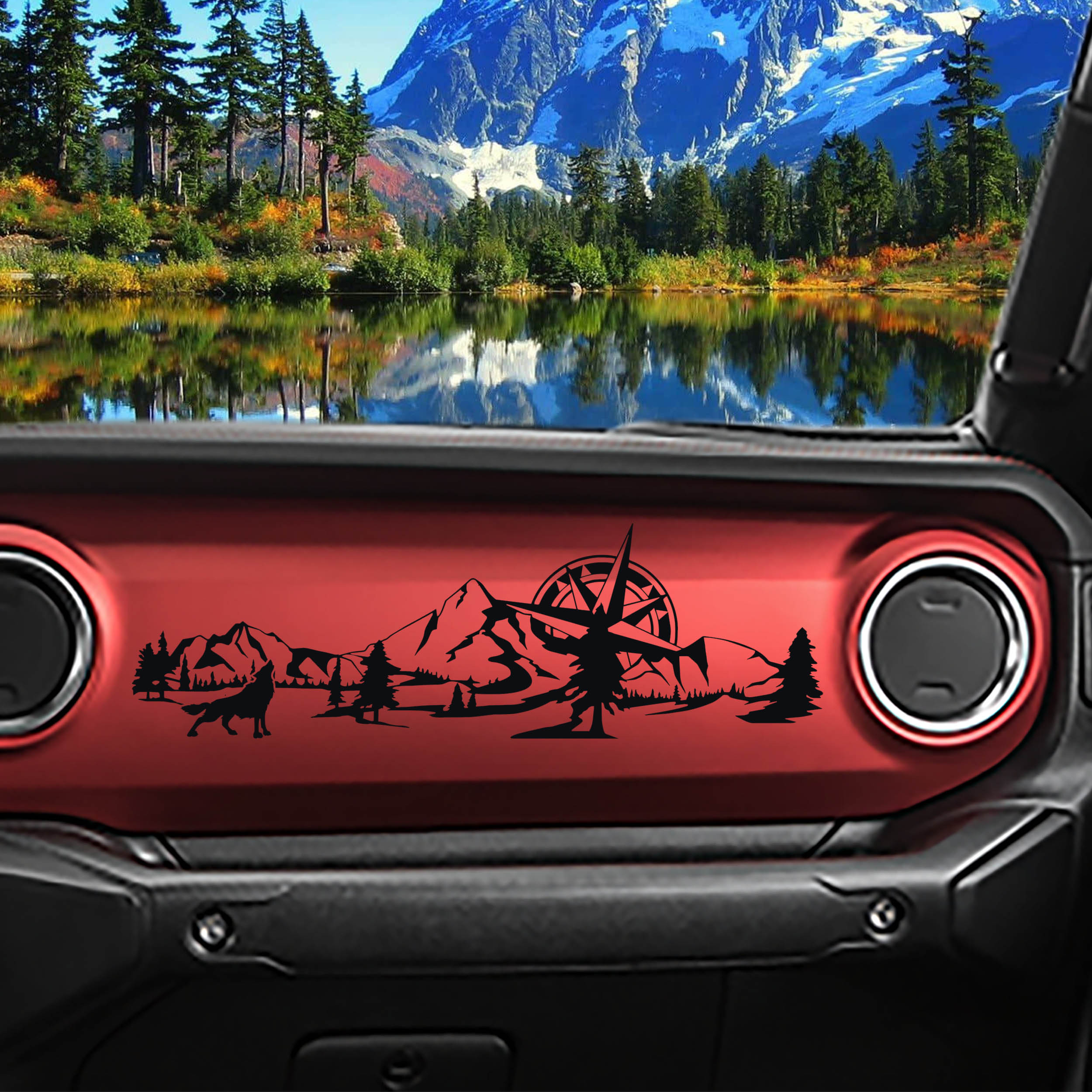 Wolf mountain compass scene dashboard decal in black installed on red Jeep Wrangler JL dash trim