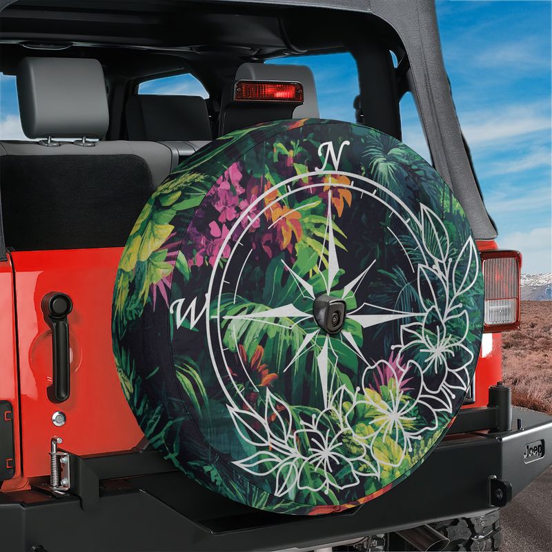 Tropical Compass Adventure spare tire cover with jungle compass on red Jeep Wrangler tailgate