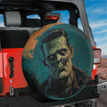 Frankenstein's Monster spare tire cover with green monster portrait on red Jeep Wrangler