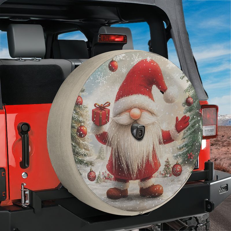 Christmas gnome spare tire cover on red Jeep Wrangler showing white beard red hat holding red gift
