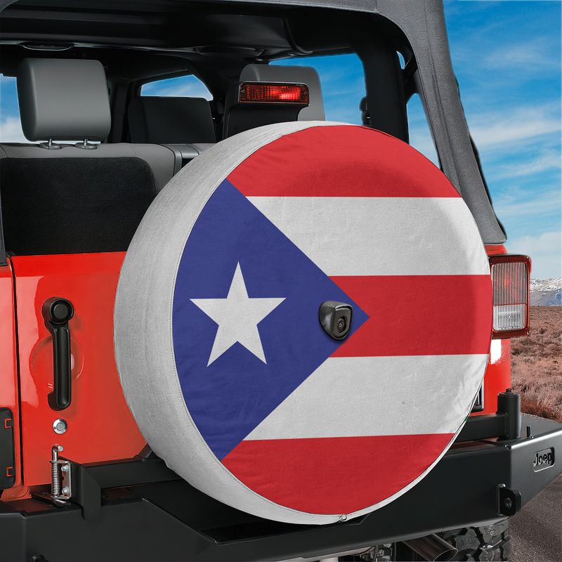 Puerto Rico Flag spare tire cover on red Jeep Wrangler with red white stripes and lone star emblem
