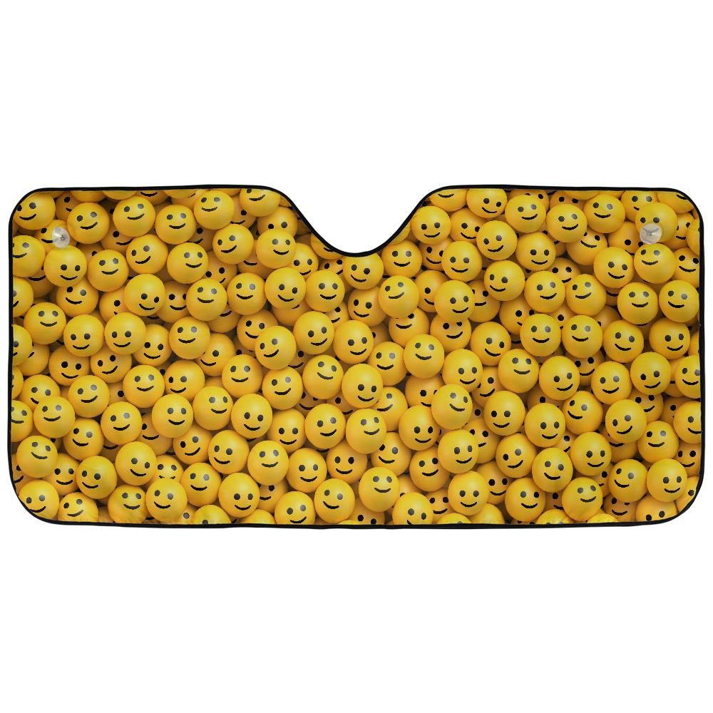 Happy Smiley Faces auto sunshade artwork displayed flat above an installed windshield mockup view