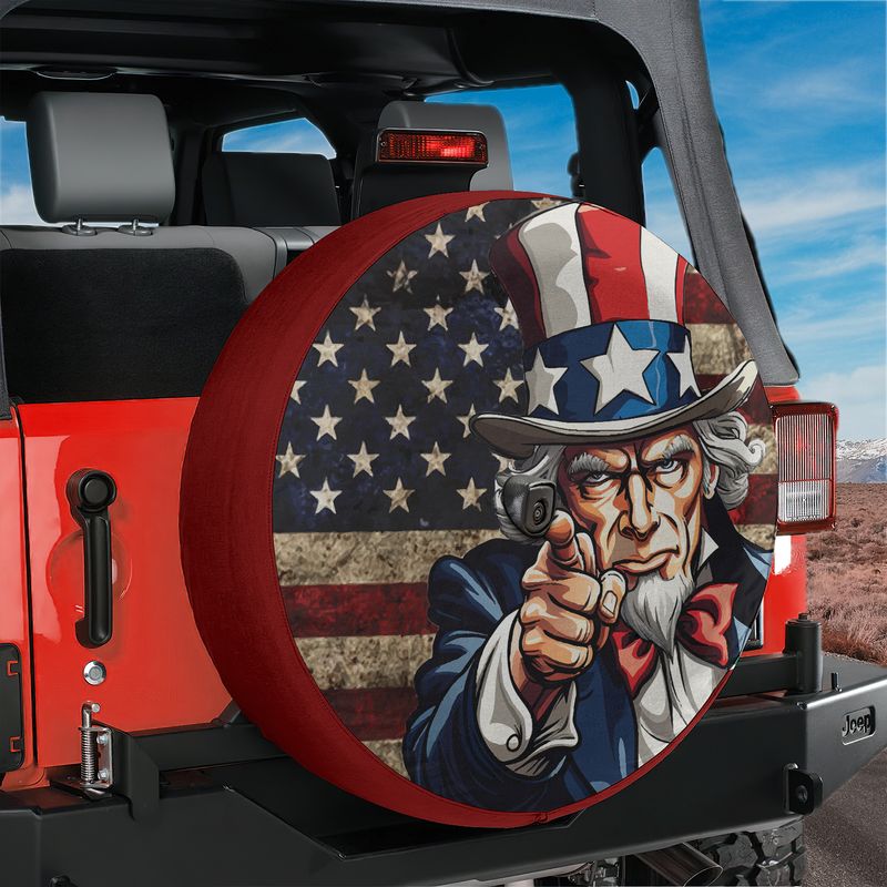 Uncle Sam's Call spare tire cover mounted on red Jeep rear with classic I Want You patriotic recruitment poster