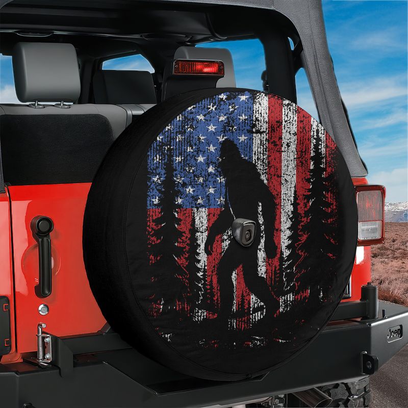 Bigfoot Across America tire cover front view with sasquatch silhouette and US landscape art