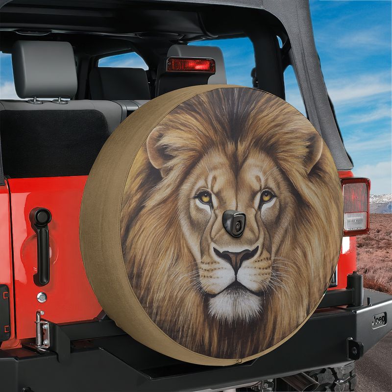 Lion of Judah tire cover white background close up of detailed lion face golden mane and amber eyes