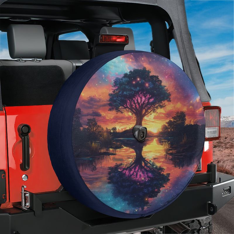 Dreamscape Tree spare tire cover on red Jeep Wrangler with sunset reflection art print