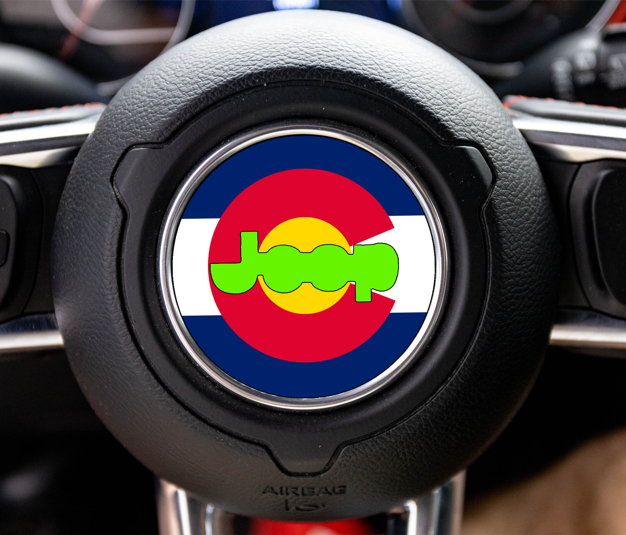 Colorado state flag red C and yellow sun Jeep steering wheel airbag center decal overlay shown