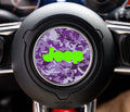 Purple digital camouflage Jeep steering wheel center decal with bright green Jeep logo on round overlay