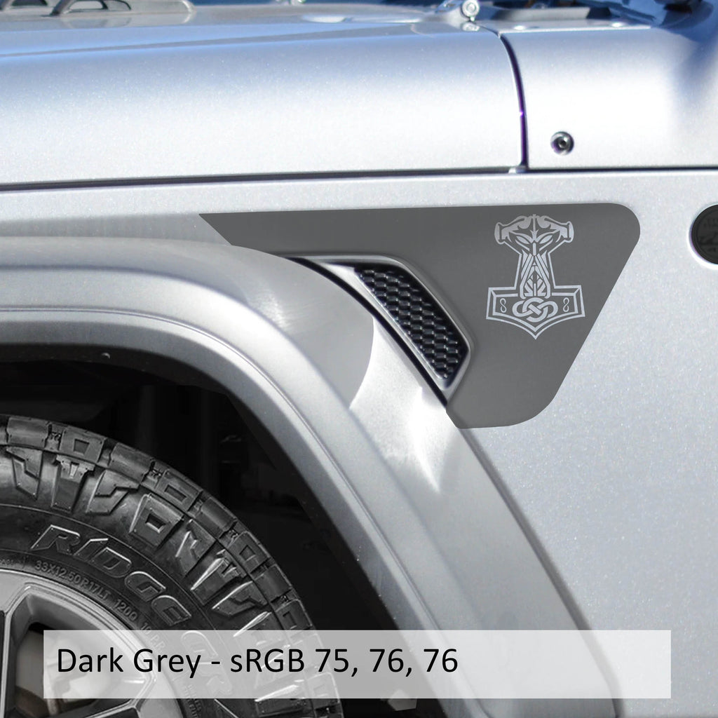 Dark gray Norse Mjolnir Thors Hammer billet fender vent transfer decal on JL Wrangler fender